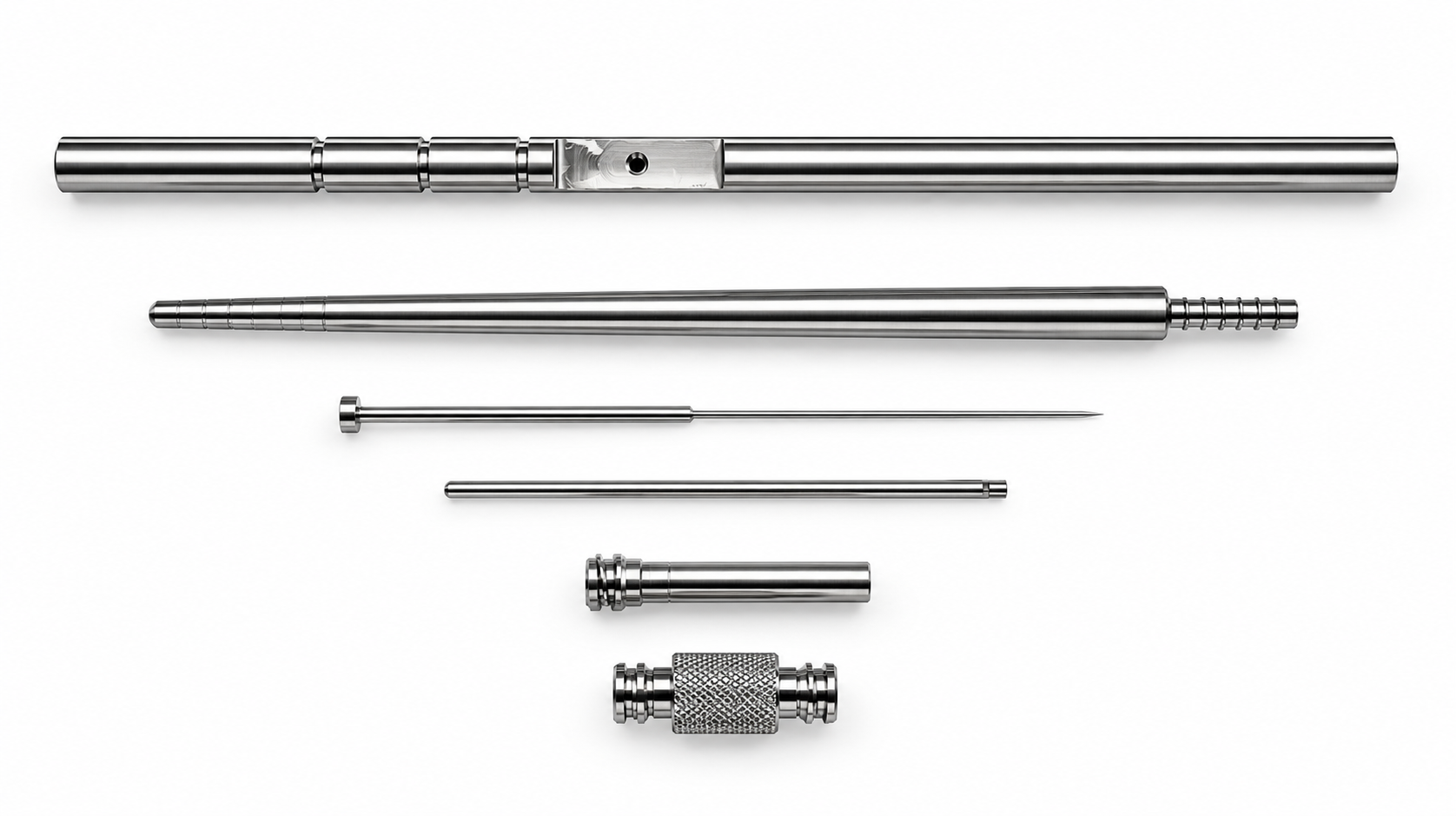 Raccords, axes et éjecteurs usinés en inox avec gorges, moletages et perçages.